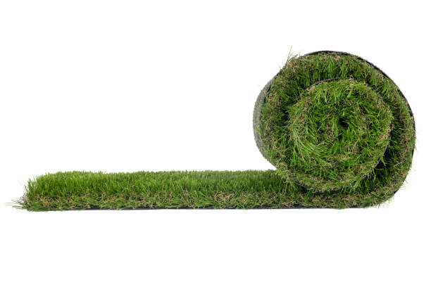 istock Rolled Green Grass Turf on White Background 2165725710