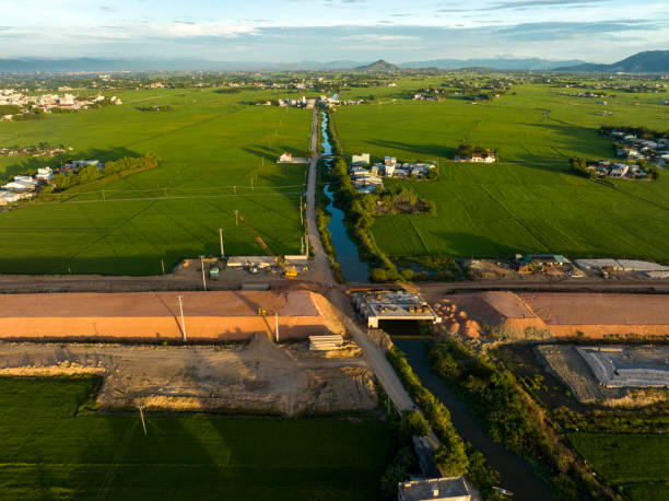 istock Highway project through rice fields in central Vietnam 2165727307