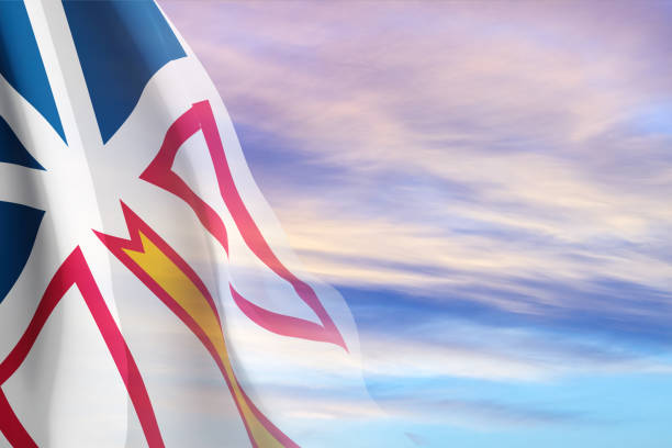 Newfoundland and Labrador flag against the sunset sky. Province of Canada
