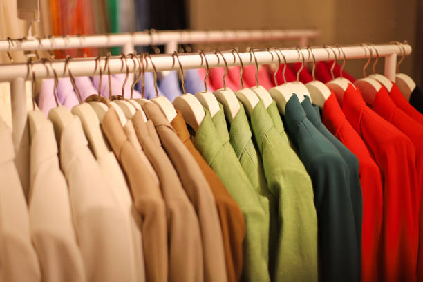 istock Clothes hangers in a shop 2165729651