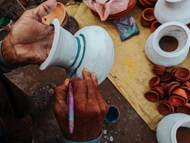 istock Painting in a clay pot 2165729755