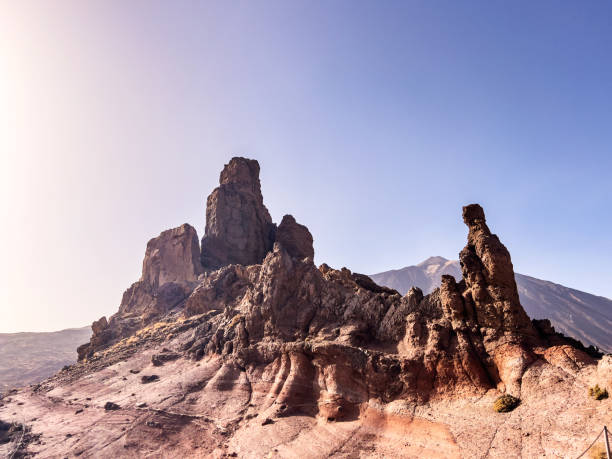 Volcanic landscape  with El Teide volcano and rock formation Roques de Garcia in the late afternoon. Canary Islands, Spain.