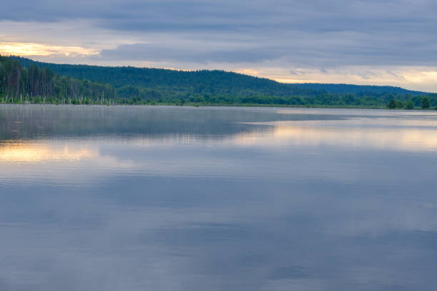 istock wide river and forest on the horizon 2165738339