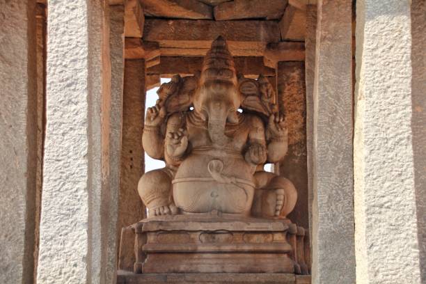 Stone bas-reliefs on the walls around the Temple in Hampi.  Unesco World Heritage Site. The famous tourist destination. Karnataka, India.
