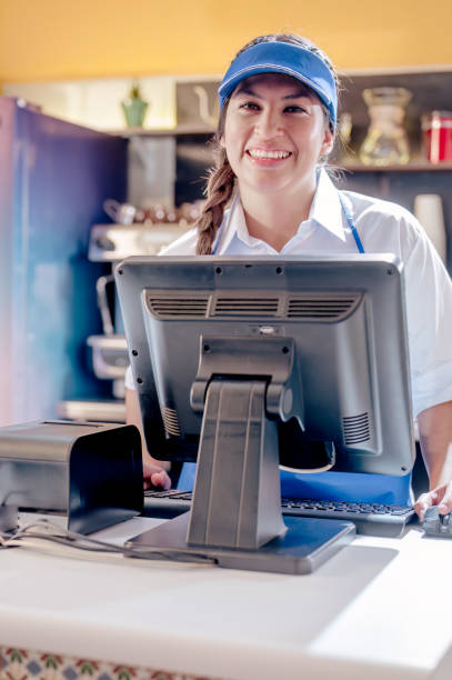 istock Young Latinos, customer service in a coffee shop. 2165740046