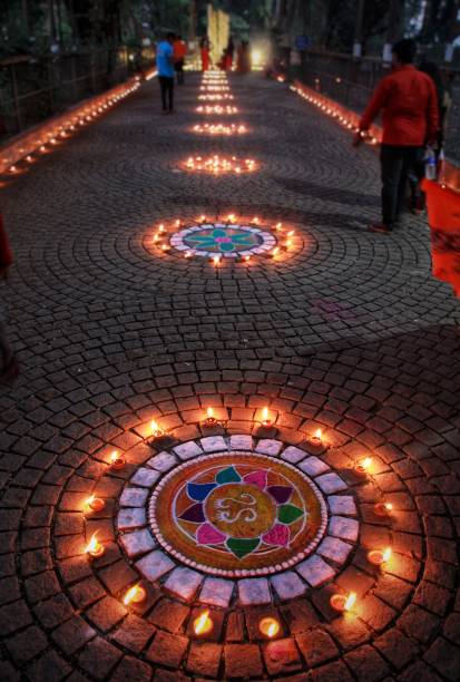 Rangoli is a traditional Indian art form where patterns are created on the floor using materials like colored rice, flour, or petals. It's also known as \