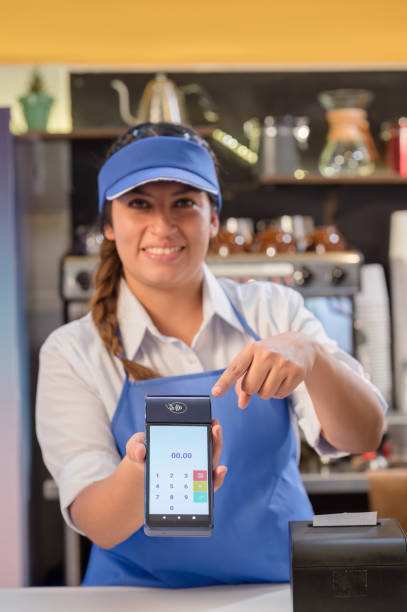 istock Young Latinos, customer service in a coffee shop. 2165741189