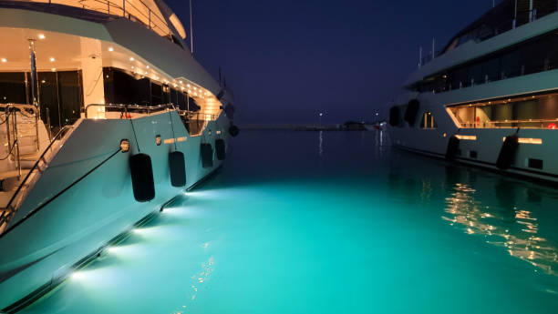 istock A yacht transmits light that is reflected in the water 2165743290