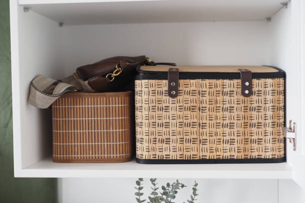 istock Explore Elegant Storage Woven Baskets and Handbags Beautifully Displayed on a Shelf 2165743334