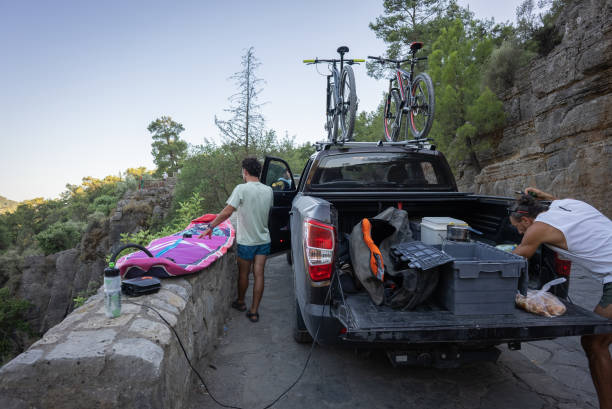 istock Male friends Getting Ready for Paddle-Boarding 2165743463