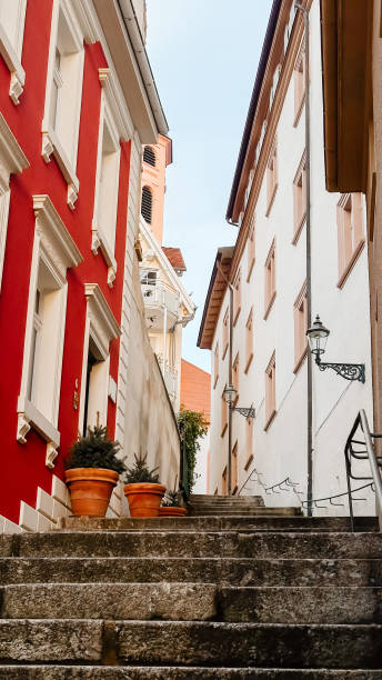 istock A red and white building with a white roof and a red window 2165745033