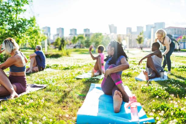 istock Yoga class outdoors, Marichyasana 2165752303