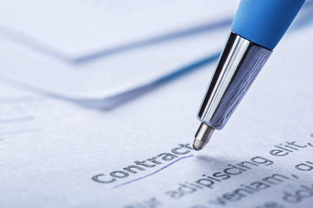 istock Accounting document with pen, share listing and checking financial chart. Concept of banking, financial report and financial audit. 2165752372
