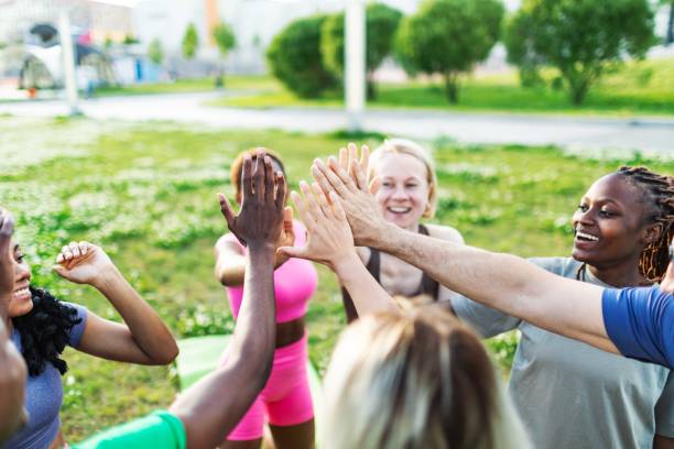 istock People relaxing after sport training, team building 2165752622