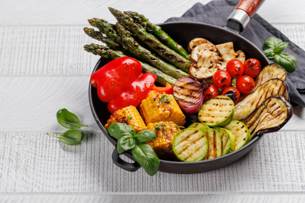 istock Assorted grilled vegetables on a frying pan, showcasing a colorful meal 2165756046