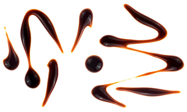 istock Collection of balsamic vinegar dropses isolated on a white background, top view. Balsamic vinegar cream. 2165763150