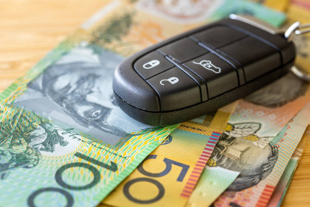 istock Car keys and Australian dollars, Transportation concept 2165765411