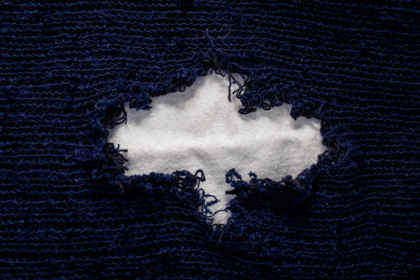 blue old wool sweater with holes