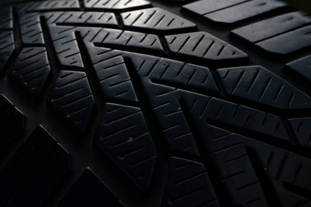 istock tire tread, tire traces background 2165769787