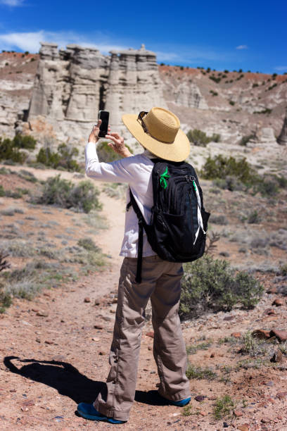 istock Abiquiu, NM: Senior Woman Hiker Taking Photo 2165773624