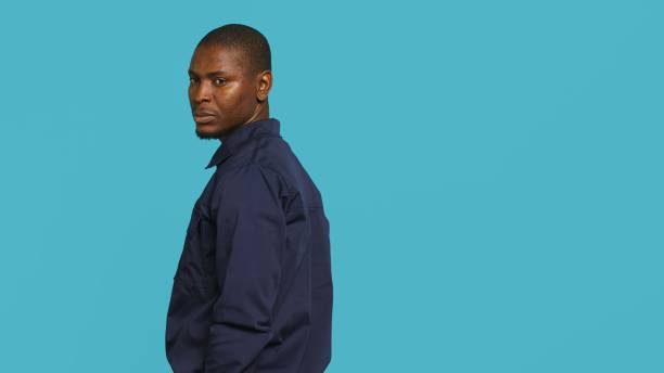 istock Security guard turning around after hearing suspect sounds 2165776265