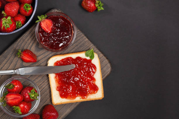 istock Toast With Strawberry Jam And Fresh Strawberries 2165780871
