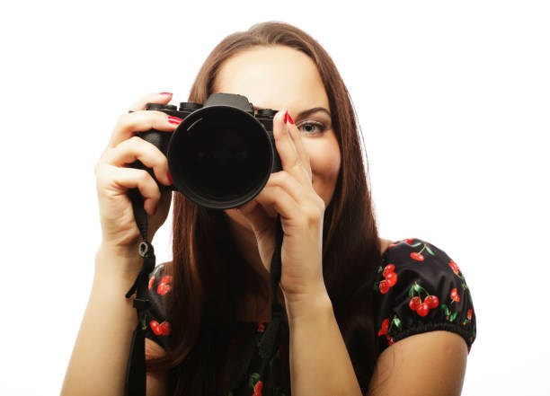 istock Cheerful young woman making photo 2165781243