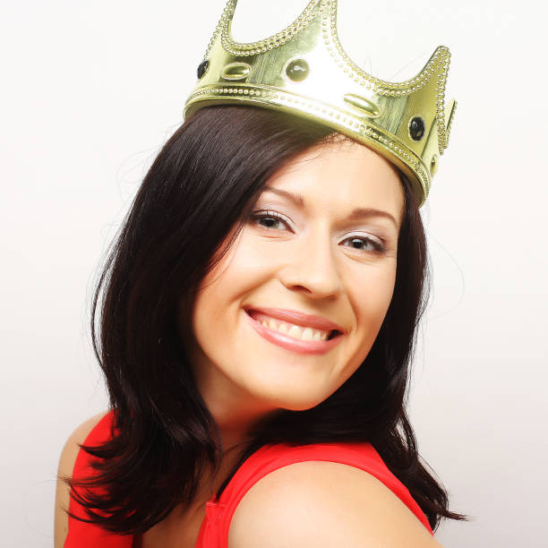 istock young lovely woman in crown 2165781407