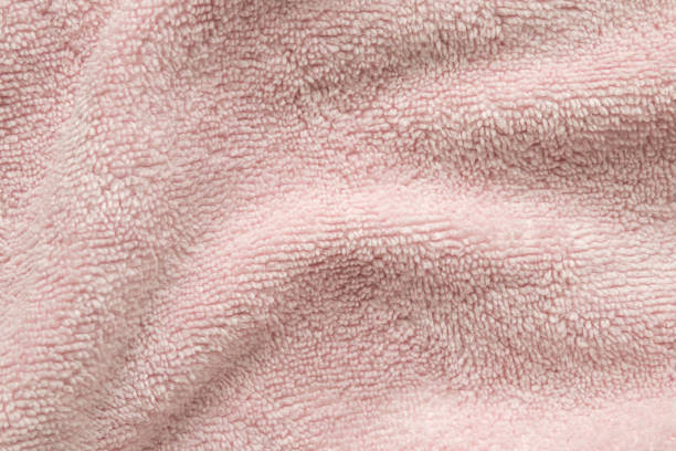 istock Pink fluffy towel fabric soft texture background 2165789240