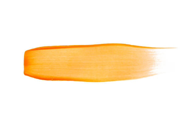 istock Orange brush stroke isolated on white background 2165789282