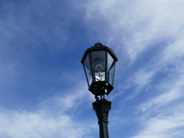 istock Vintage streetlamp during daytime with cloudy blue sky background 2165795016