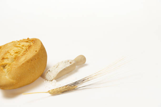 Variety of fresh bread on old wooden background.