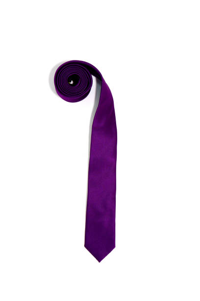 istock A purple color necktie rolled isolated on white background single object 2165801621
