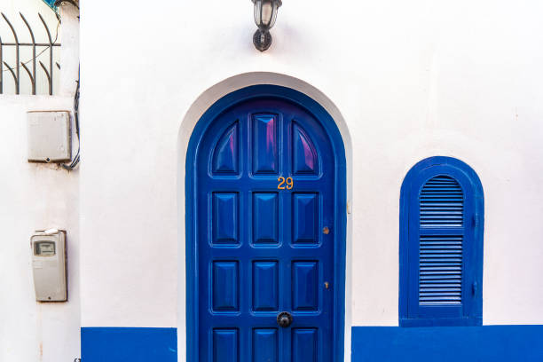 The door and white wall, Asilah, Morocco.