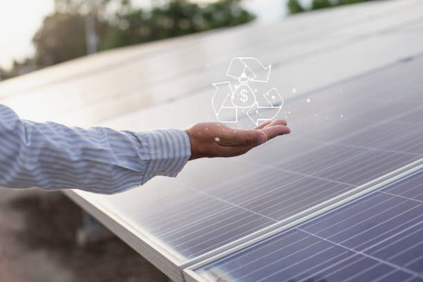 istock Renewable energy concept, environmentally friendly and sustainable development. People holding recycling symbol on virtual screen 2165806432