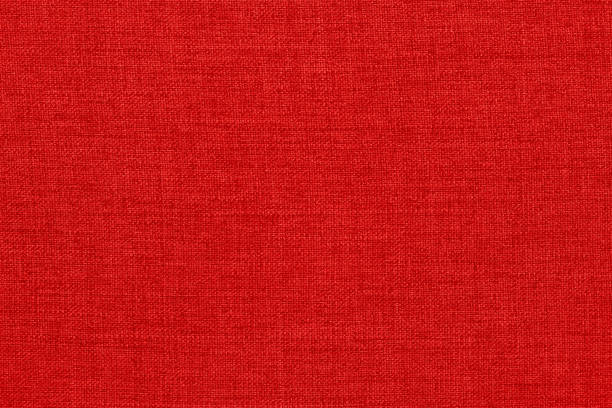 Dark red linen fabric cloth texture background, seamless pattern of natural textile.