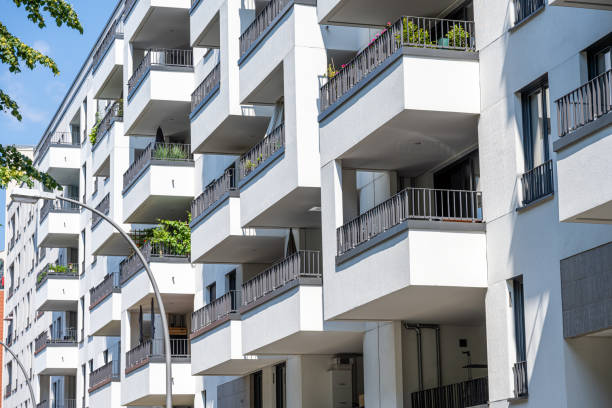 istock The facade of a white modern apartment building 2165808267