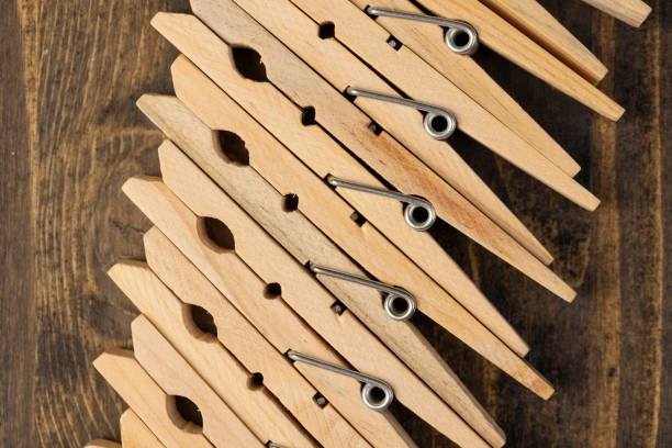 close up clothespins on the table, wooden clothespins for drying clothes