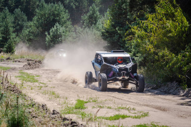 istock UTV buggy, 4x4 competition on dusty road. Rally, extreme, adrenalin 2165811008