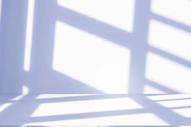 istock Studio style background wall decoration presentation uses white and blue tones. with shadows cast from a nearby window, concept creating a decorative 2165815534
