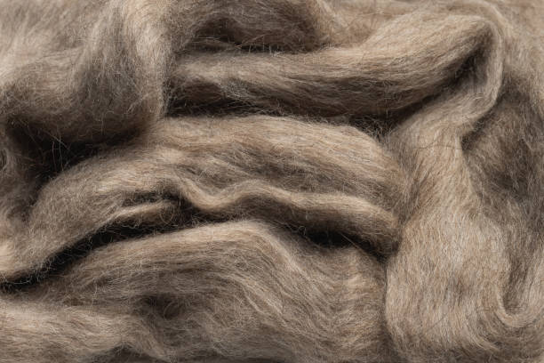 istock Beige background, natural wool fabric texture. 2165818759