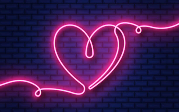 istock Glowing neon continuous line icon isolated on brick wall background. Pink color heart shape icon 2165819143