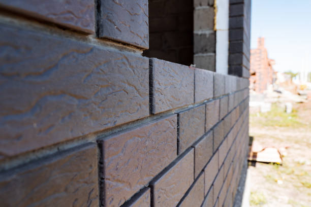 istock Closeup view of a brick wall in a construction site with a focus on its texture, showcasing the craftsmanship and quality work in building and engineering this structure 2165820488