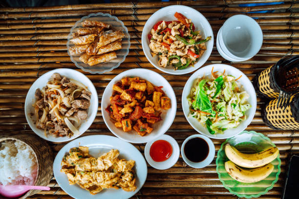 istock Traditional Vietnamese Cuisine Spread on Bamboo Mat 2165822842