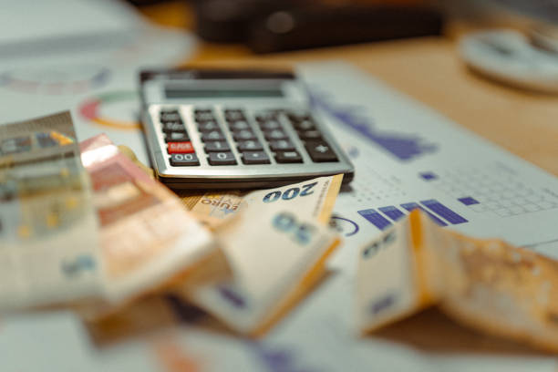 banknotes receipts statistics of household budget expenses. Calculator euro currency.