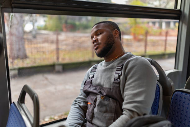 istock Young man riding in a bus 2165827613