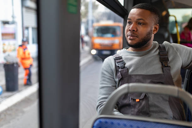 istock Young man riding in a bus 2165827644