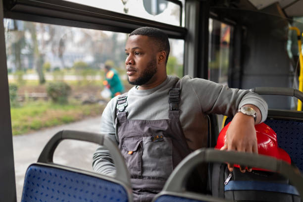 istock Young man riding in a bus 2165827660