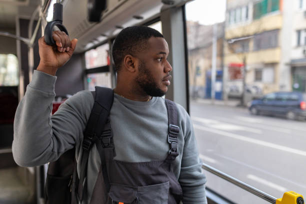 istock Young man riding in a bus 2165827865