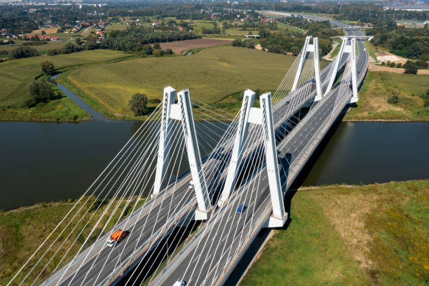 istock Suspension highway bridge with traffic 2165830534